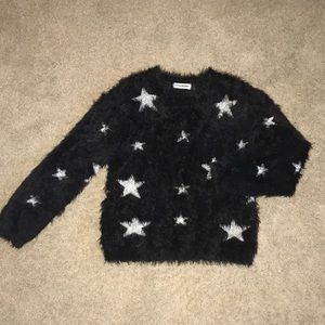 Black furry star sweater
